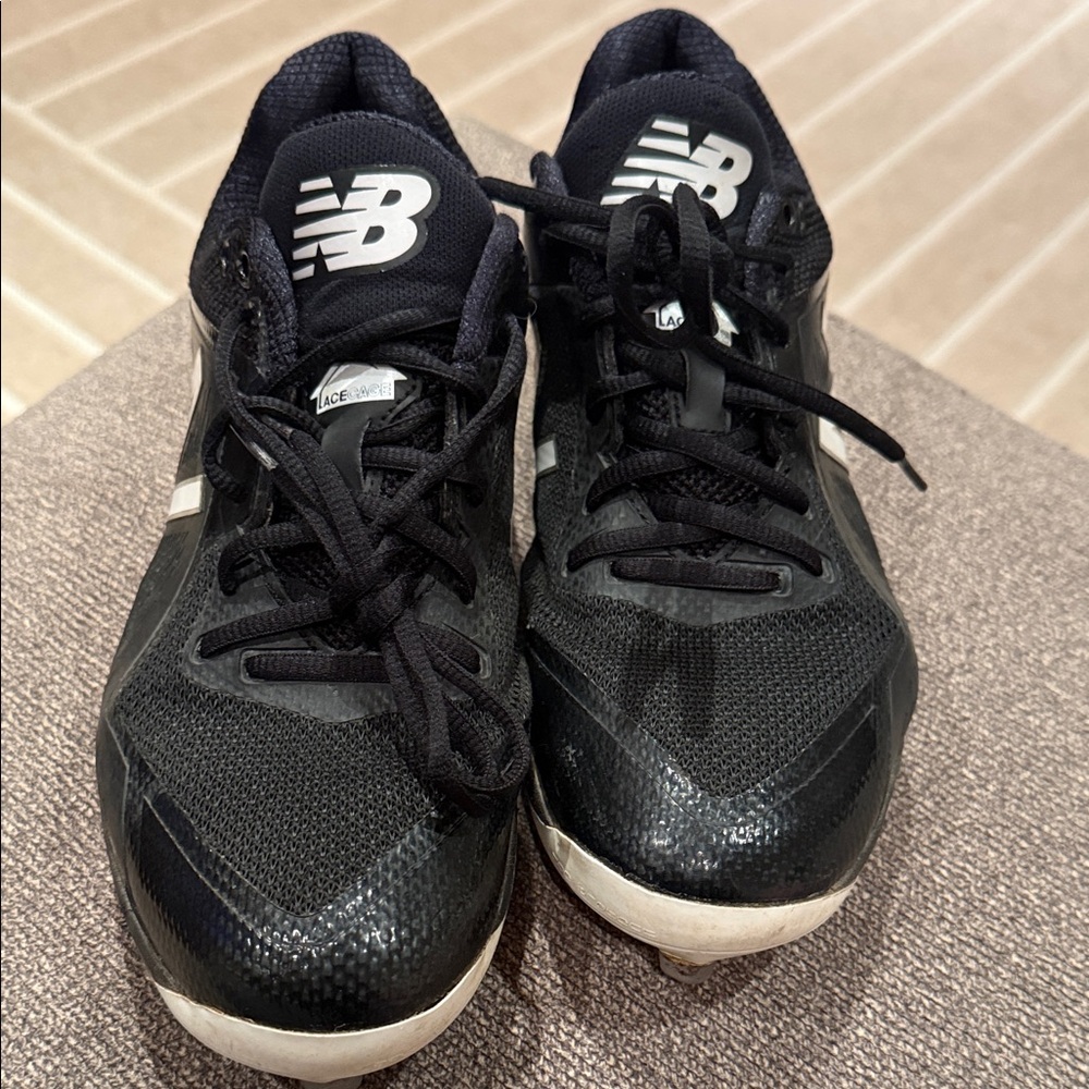 New Balance— Black and White baseball cleats